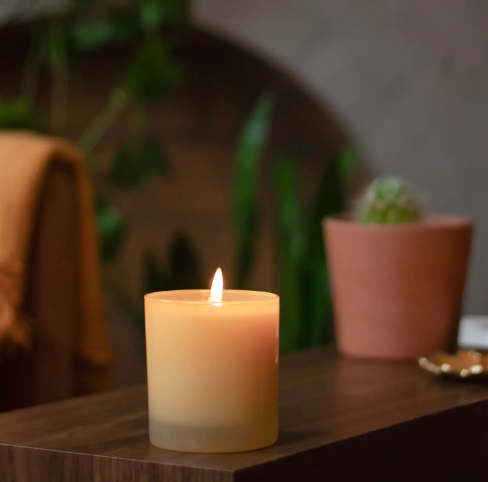 Add a warm glow and whimsical fragrance to your home with the vegan and cruelty-free Golden Hue Candle by GP Candle Co.