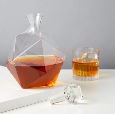 Elegant liquor decanter with a smooth neck designed for an even, steady pour.