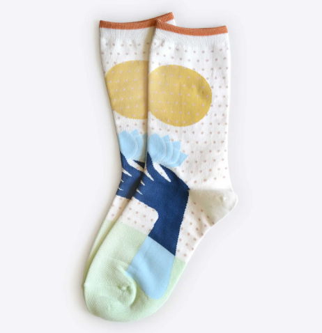 A fun, lightweight, and cozy boost; they feature a bold blue and gold lotus design.