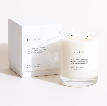 Elevate your gift-giving with an artisan travel-inspired candle that comes beautifully packed in a rigid, crisp white textured presentation box.