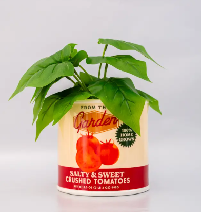Add a playful pop to your kitchen decor! This whimsical Ban.do ceramic vase cleverly disguised as a tomato can is the perfect unique way to showcase your favorite blooms.