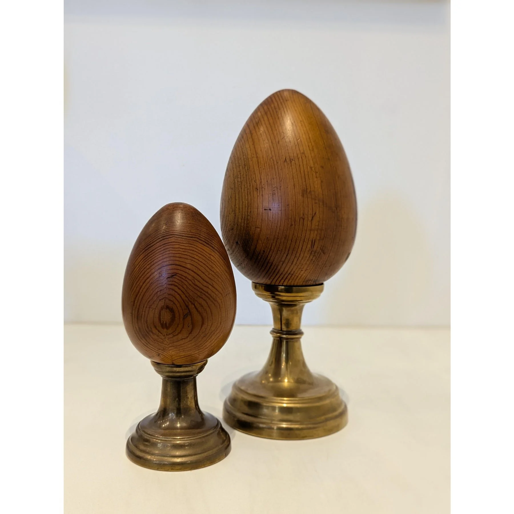 pair-of-wood-and-brass-finial-sculptures-by-sarreid-ltd-5551.jpeg