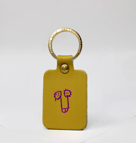 Ochre leather willy keyring with a gold-plated ring, a humorous and high-quality novelty keychain.