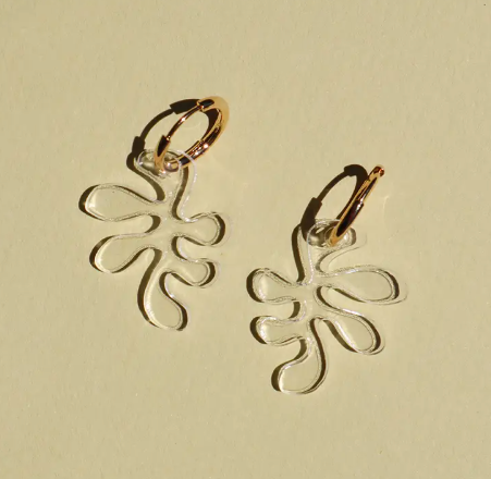 Other shapes' Clear Ant Charm Earrings offer a chic, minimalist look with a removable acrylic charm for easy customization.