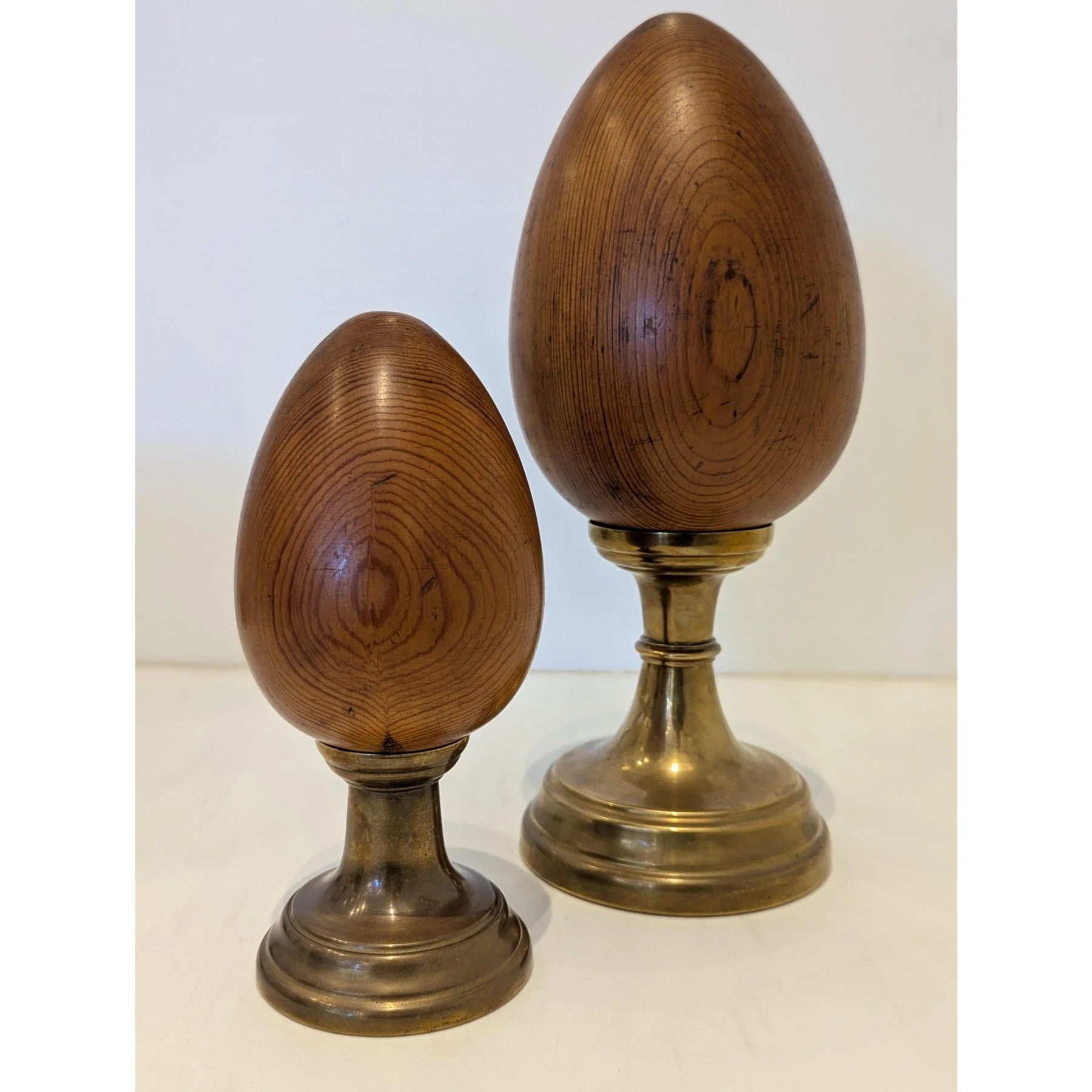 pair-of-wood-and-brass-finial-sculptures-by-sarreid-ltd-8351.jpeg