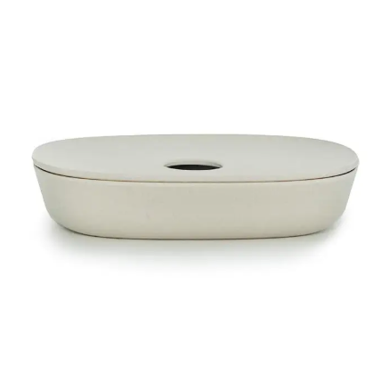 A minimalist white bamboo fiber soap dish featuring a 2-piece design with a centered drainage hole.