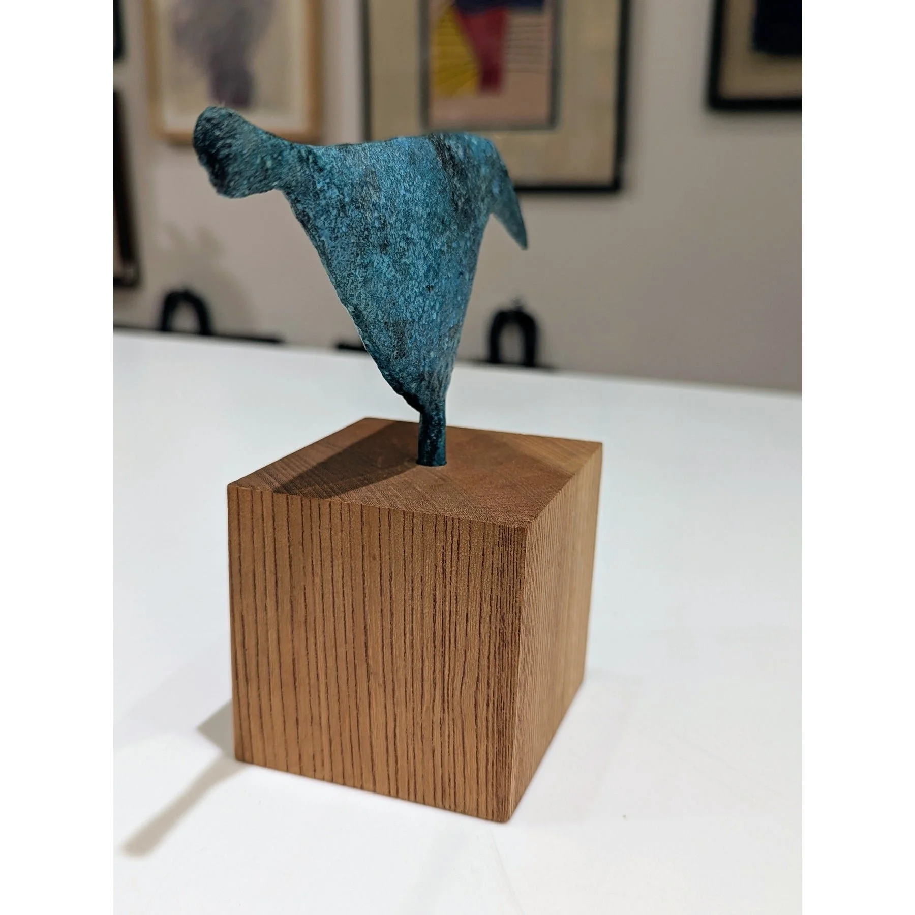 verdigris-bronze-bird-sculpture-on-wood-base-1409.jpeg