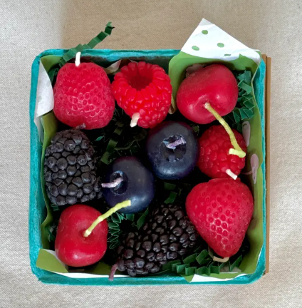 Display a colorful harvest of two strawberries, two blueberries, two blackberries, two cherries, and two raspberries neatly arranged in a green-lined basket from Happy Organics