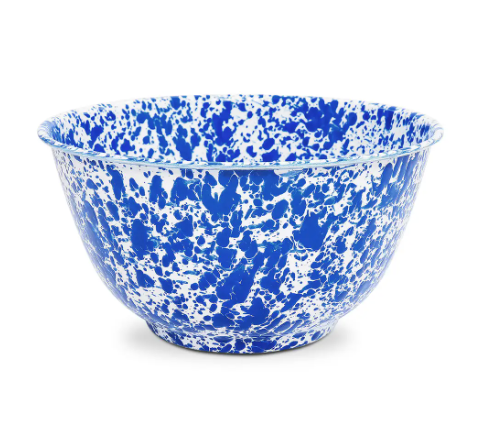Catalina Large Salad Bowl in Blue Splatter, showcasing its unique enamel splatter design and smooth, curved shape.