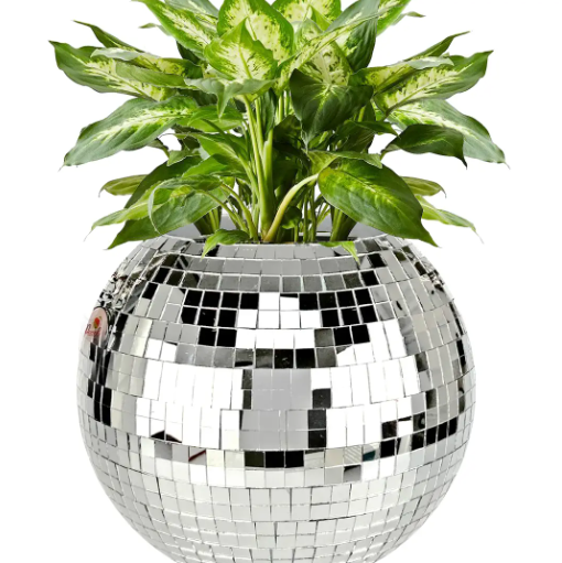 Elevate your plant game with the Nomatiq Disco Ball Planter, a self-watering masterpiece that brings dazzling light and retro style to any indoor greenery