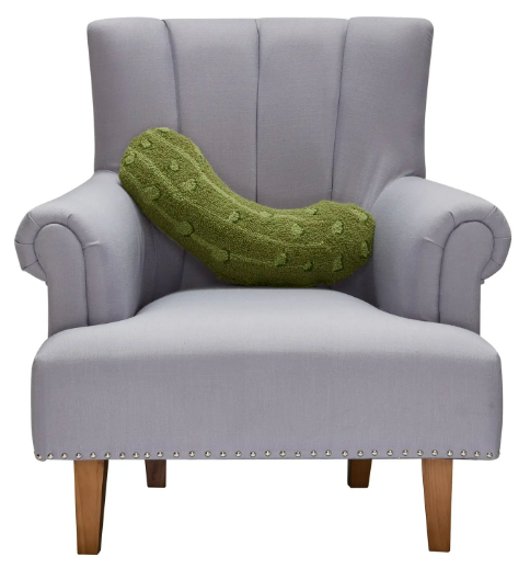 A fun and colorful pickle accent pillow, perfect for adding a quirky touch to modern home decor.