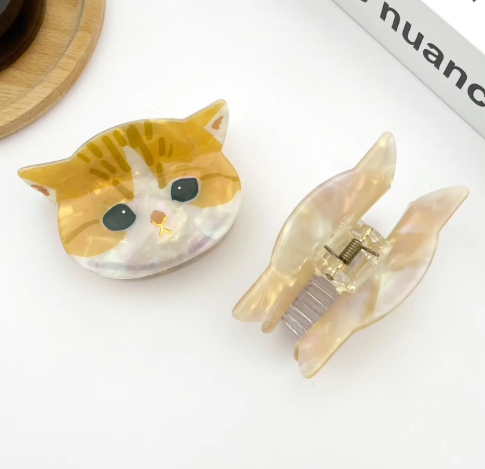 Playful cat-themed hair accessory by TheDivaSoap featuring a durable acetate construction and a strong spring grip.