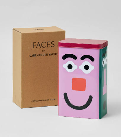 Durable metal storage tin for tea and dry goods with a vibrant character illustration and protective boxing.