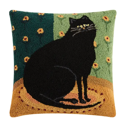 A 16x16 inch wool hooked throw pillow featuring a black cat design by Warren Kimble.