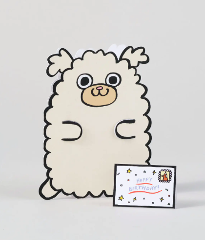 An interactive birthday card featuring a die-cut dog and a separate mini card.