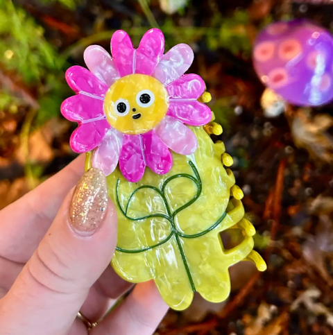 Eco-friendly cellulose acetate hair clip with a unique Flower Boy design, perfect for adding a playful touch to any hairstyle.