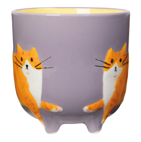 View the front profile of the lavender Ginger Cat Critter Mug by Danica Jubilee, displaying two sculpted cats perched on little feet.