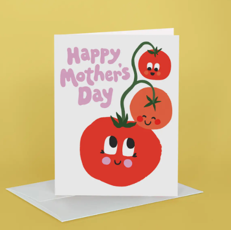 A whimsical Mother's Day card by Idlewild Co. featuring a hand-painted family of three red tomatoes with smiling faces.