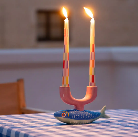 Decorative ceramic fish candlestick holder by Talking Tables USA, featuring a sculptural design for modern and playful home decor.