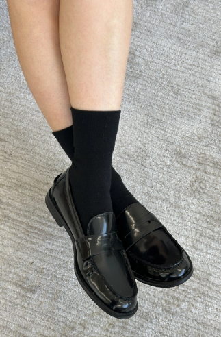 Transition seamlessly from work to weekend with the versatile Black Sneaker Socks by Le Bon Shoppe, styled elegantly with classic loafers.