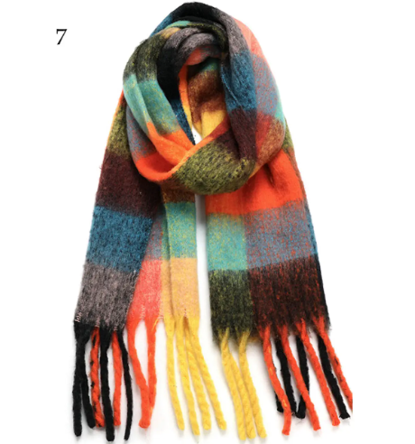 A vibrant red and blue plaid scarf, perfect for adding cozy style and color to your winter look.