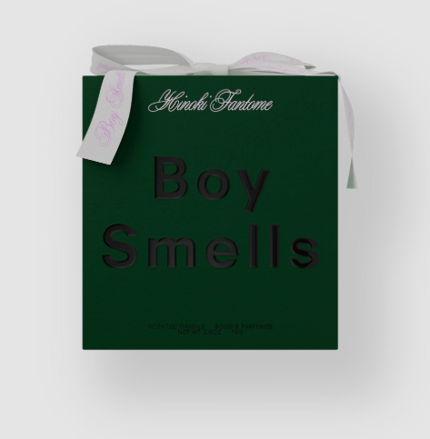 The green box of the Boy Smells Hinoki Fantôme candle tied with a white ribbon.