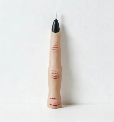 Create a chilling focal point with the realistic Finger Halloween Sculpted Candle by CouldNook, complete with lifelike knuckle creases and a dark nail finish.
