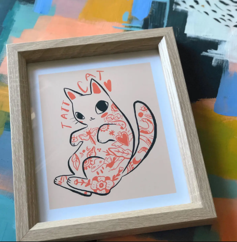 An 8x10 art print of a tan cat covered in black and red tattoos in a classic illustration style.