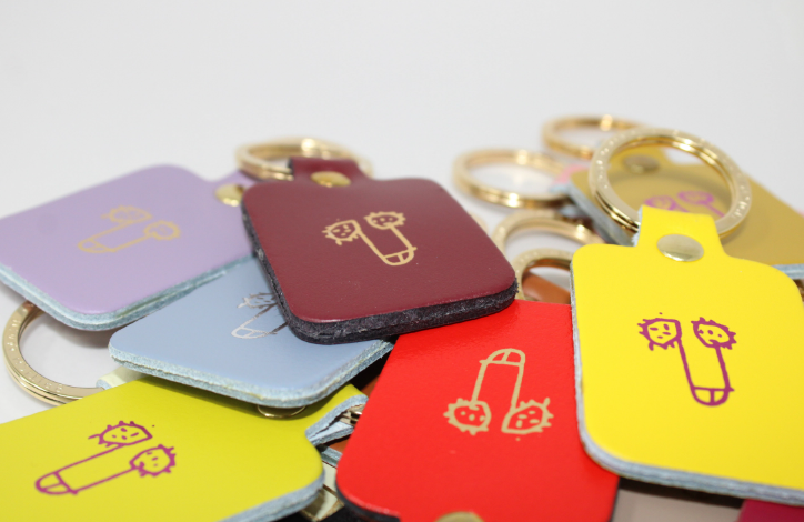 A playful pile of colorful leather willy keyrings, a fun and cheeky accessory handmade in the UK.