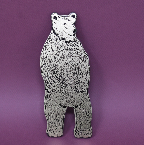 Cream bear magnet by Ark Colour Design, showcasing its detailed hand-embossed texture against a solid background.