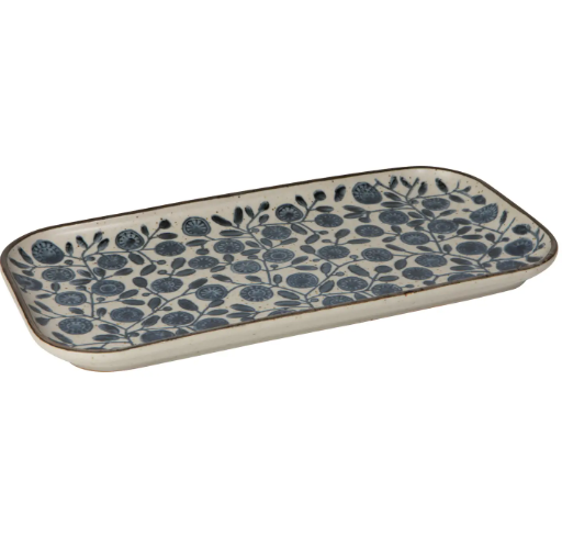 Serve in style! An elegant stoneware serving platter with a delicate pattern, bringing elemental beauty to your table.