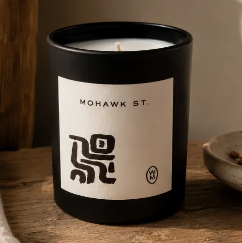 Create an inviting, cozy sanctuary with the warm and sophisticated glow of the Wilkin & May Mohawk St. Luxury Candle.
