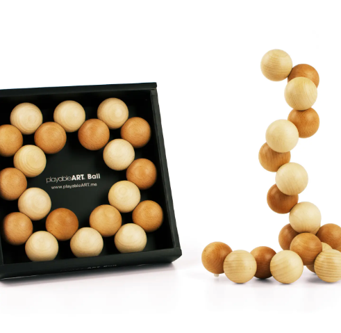 Playable Art Ball by Beyond123 in a black presentation box - Natural.