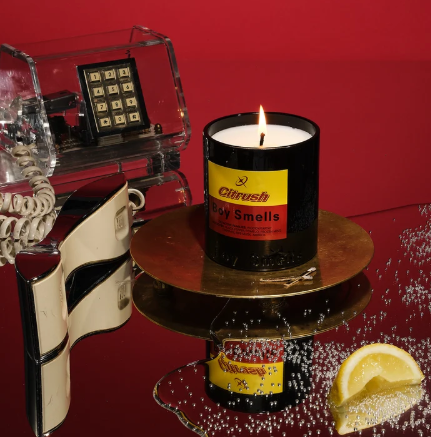 Light up pride with the Citrush Candle by Boy Smells, featuring bold notes of pomelo and black pepper in a sleek black glass tumbler.