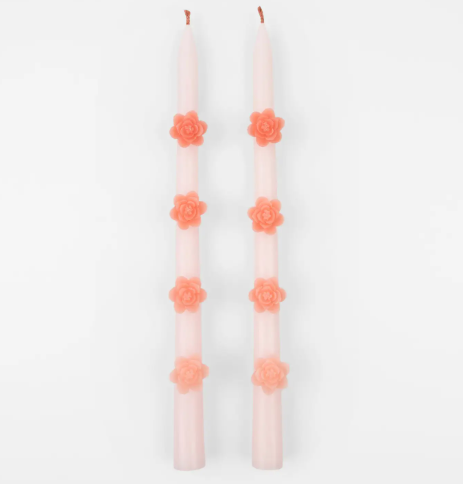 Elegant pink taper candles by Meri Meri featuring intricate pink ombre wax flowers and a matching pink wick.