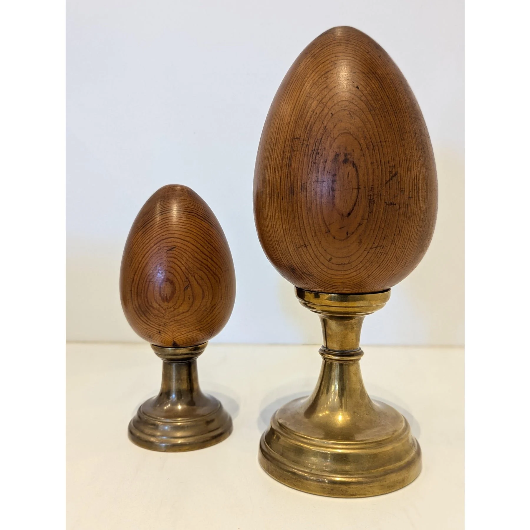 pair-of-wood-and-brass-finial-sculptures-by-sarreid-ltd-0996.jpeg