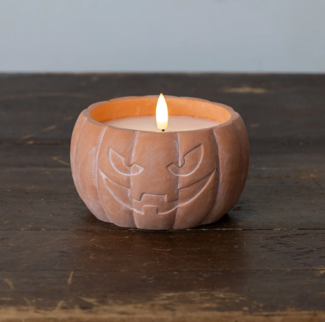 Add cozy autumn warmth to your tabletop with the Orange Jack-O-Lantern 3D Flame Candle by Ragon House, featuring a realistic flickering flame and a carved pumpkin design.