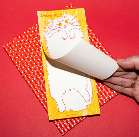 Jot notes with a smile! A playful cat-themed notepad, ready for your lists and ideas.