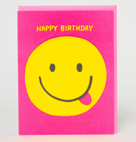 A fun and bright A2 birthday card with a cheerful smiley face illustration for a bold celebration.