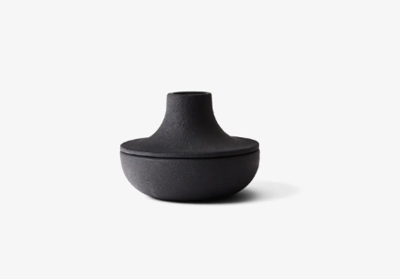 Industrial style candle and incense holder, perfect for minimalist home decor and mood setting.