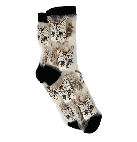 A black mesh sock with a fun pattern of white cat faces, an excellent accessory for any casual outfit.