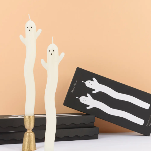 Set the ultimate spooky-chic tablescape with Meri Meri's ghost candles, styled in gold holders to elevate your Halloween decor instantly.