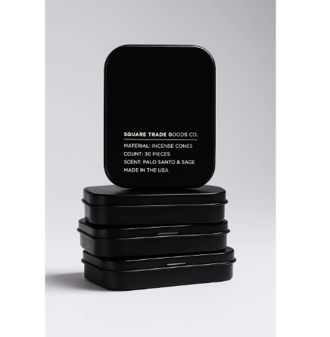 Transform your space with Palo Santo & Sage Incense Cones by Square Trade Goods Co, presented in sleek black travel tins.