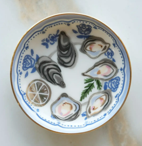 Close-up of the Oysters Trinket Dish, highlighting the details of the design and the 10k gold rim.
