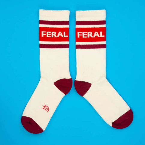 High quality mid-calf athletic socks by Gumball Poodle featuring a comfortable ribbed texture and fun statement design.