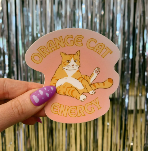 High-quality glossy cat sticker with UV protection, perfect for decorating a water bottle or laptop.
