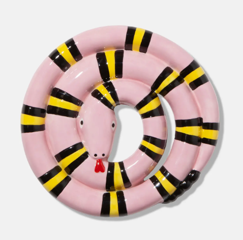 Spice up your kitchen decor with a modern pink and yellow striped ceramic snake trivet designed to support hot pots and pans with playful style.