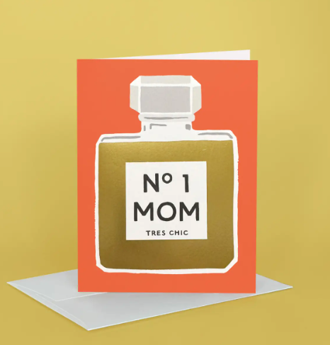 A chic Mother's Day card by Idlewild Co. featuring a hand-painted perfume bottle with gold foil accents and "No. 1 Mom" text.