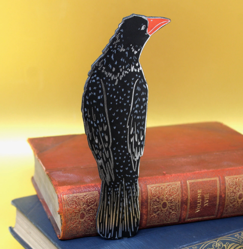 Save your page in style with the Rook in A Book leather bookmark by Ark Colour Design, featuring a striking illustrative rook design.