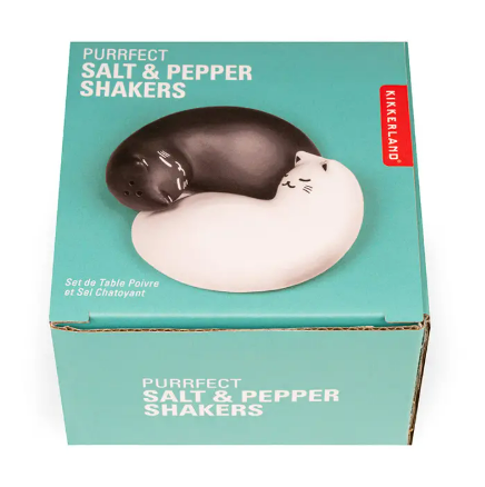 Whimsical cat-themed ceramic kitchen accessories from Kikkerland Design Inc for a stylish and playful table setting.